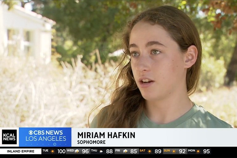 Miriam Hafkin has long wavy brown hair and sits outdoors on a sunny day. Text at the bottom reads KCAL News CBS News Los Angeles. Miriam Hafkin sophomore.