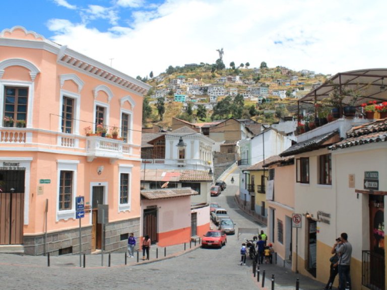 historic center of Quito showing pink and white buildings