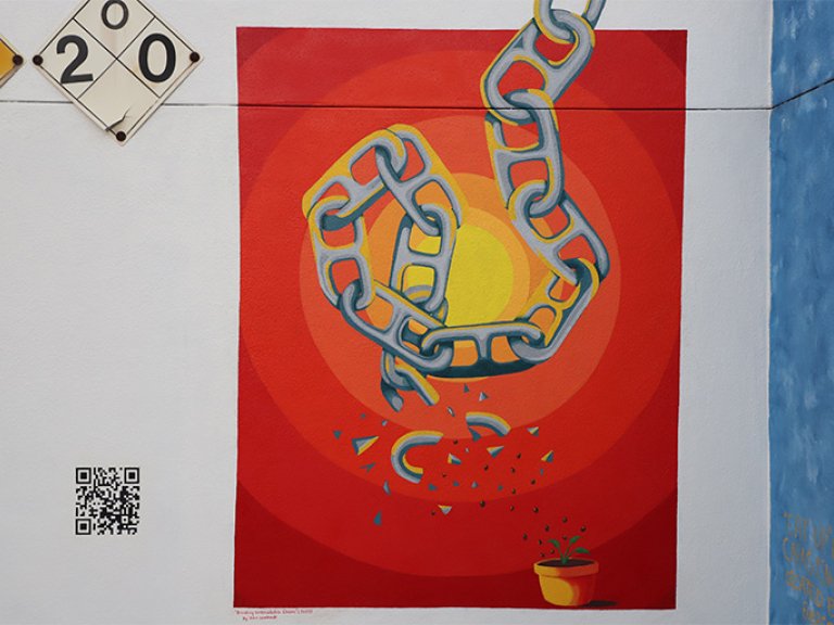 The mural "Breaking Unbreakable Chains" by Pitzer student Alexandra Lombardi