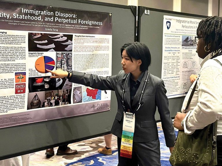 Ezriella Tange presents her poster at the American Anthropological Association annual meeting