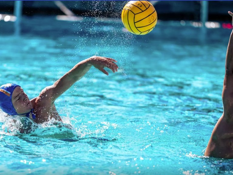 Chase Barman in the water during a water polo game