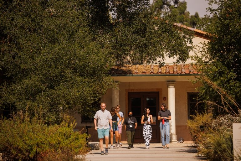 Students walk out of the Robert Redford Conservancy building