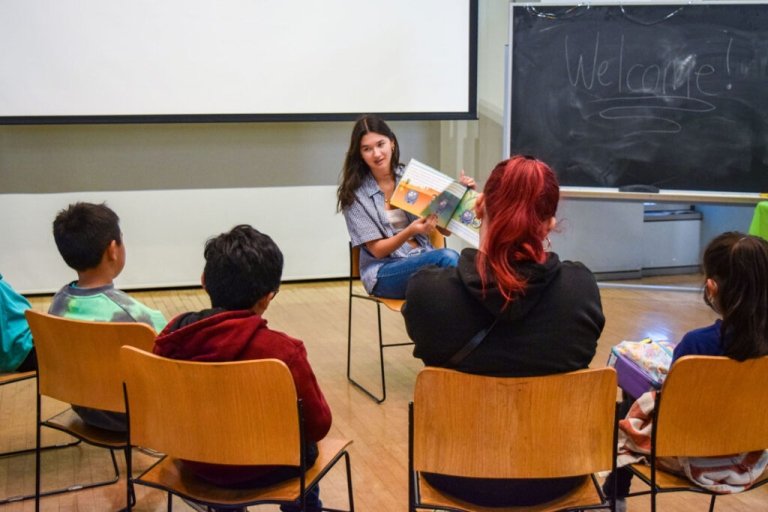 Ava Park Matt reads to school children