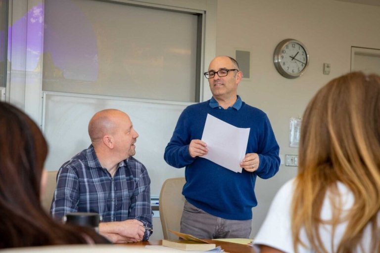 Shields and Zuckerman teaching in a classroom