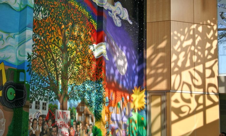 A view of the mural in benson auditorium