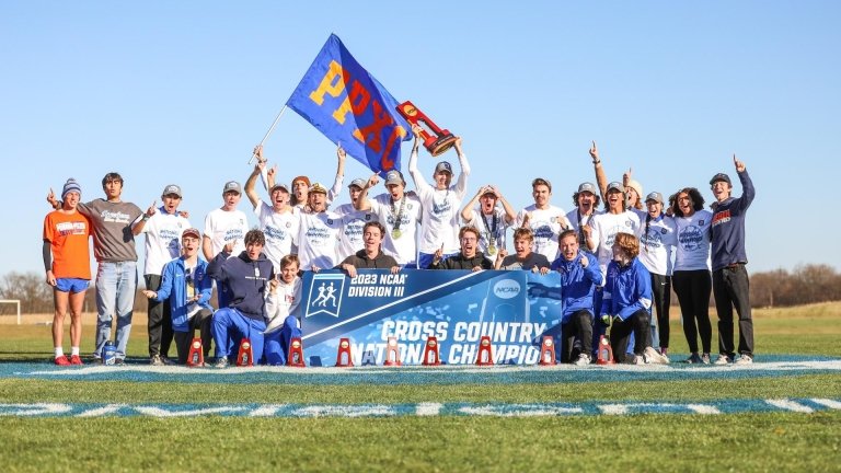 The Pomona-Pitzer Men's Cross-Country team celebrates after a national championship victory
