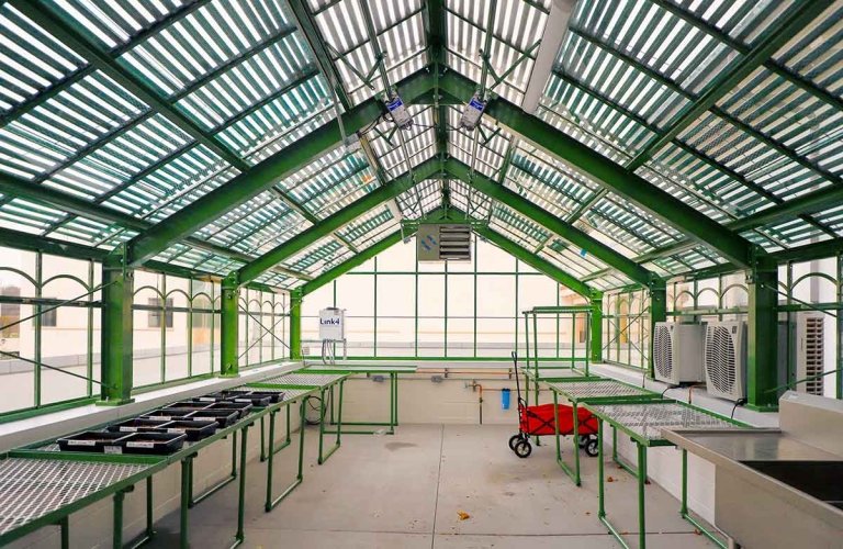 view of the inside of an empty greenhouse