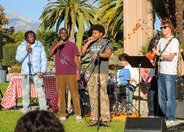 a band plays on the mounds