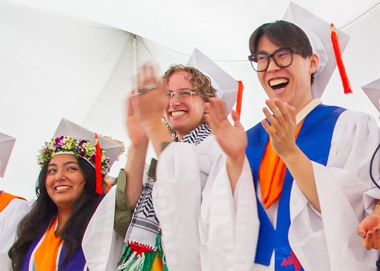 Pitzer students give a standing ovation during commencement