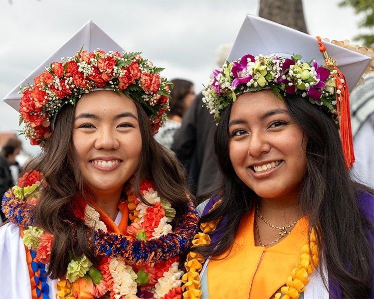 Two Pitzer graduates celebrate