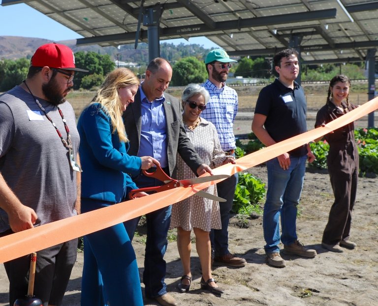 Dep Secretary Virginia Jameson cuts the ribbon at Spadra Farm site
