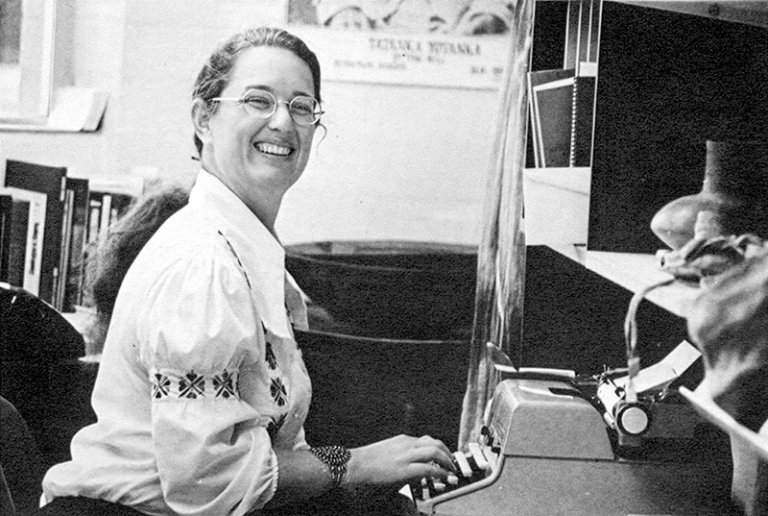 Sheryl Miller at work on a typewriter