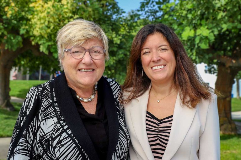 Mora and Feboli pose on the Pitzer Mounds