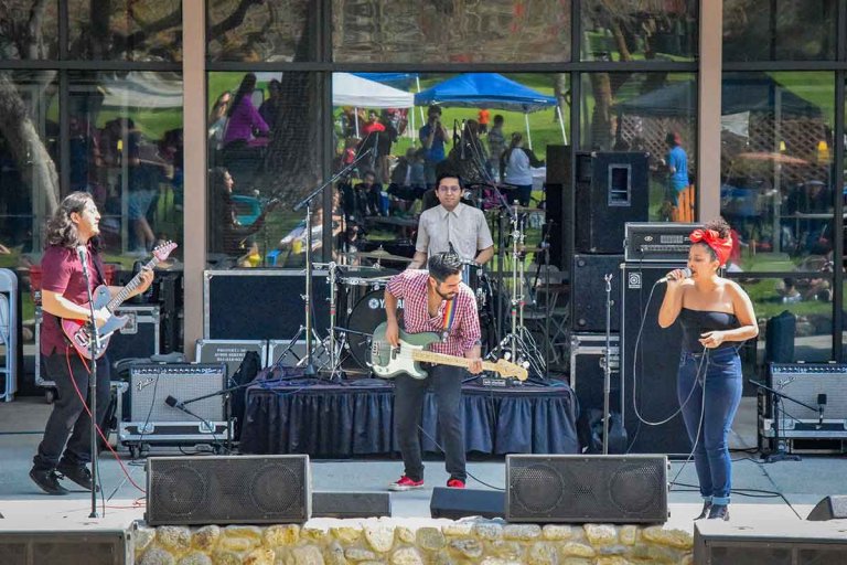 a band plays on the McConnell Apron