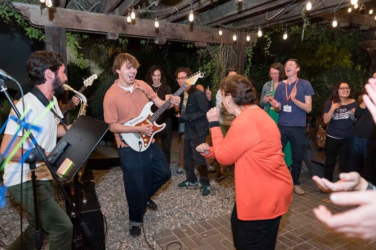 Noah Straus and band play in the outdoor classroom at Alumni Weekend
