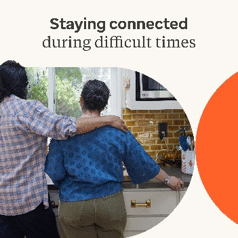 A couple holding each other with words staying connected during difficult times