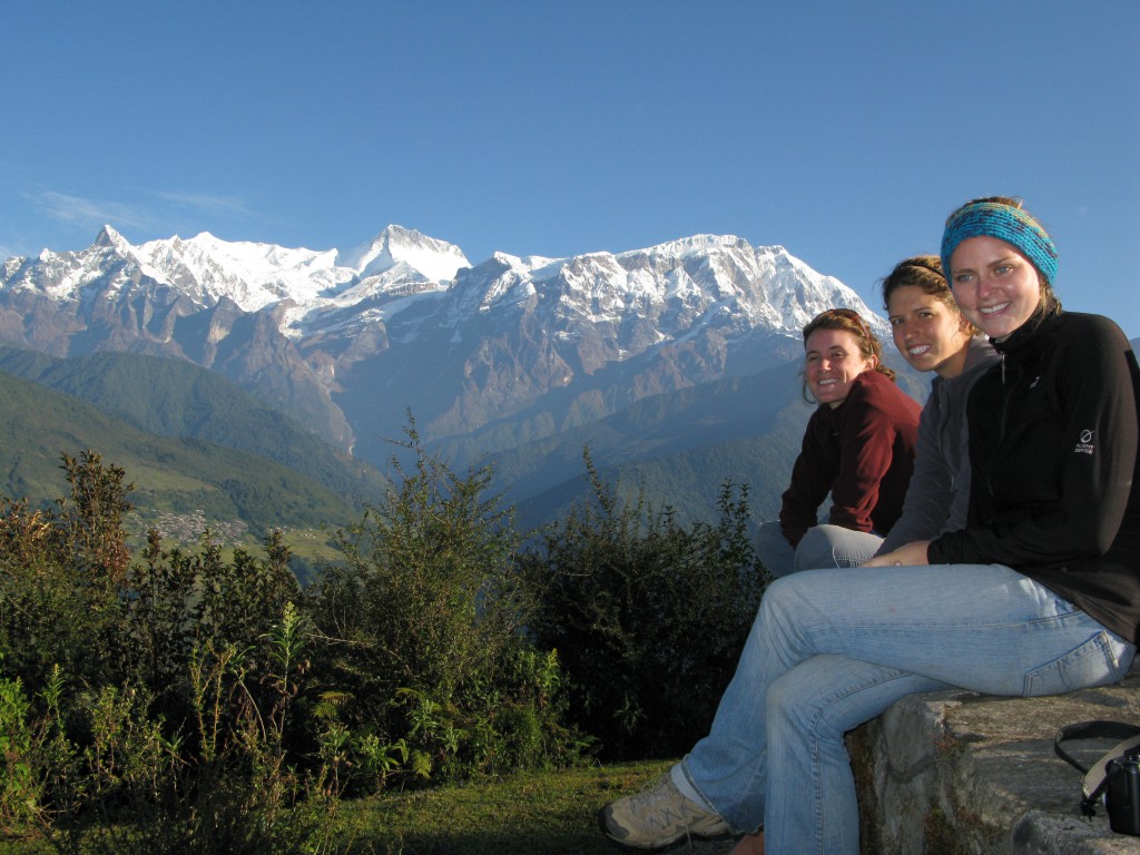 Pitzer students in Nepal with the Himalayas in the background.