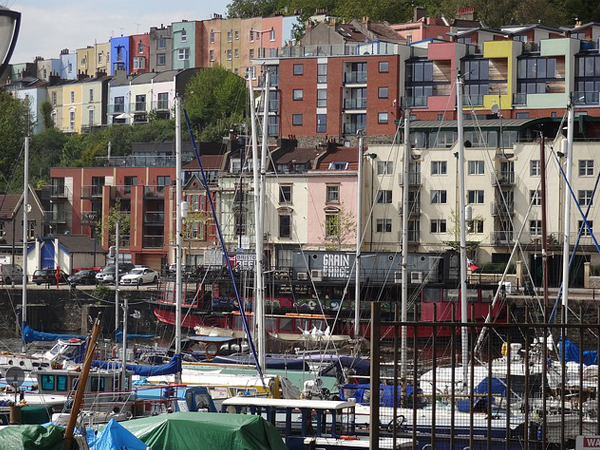 Houses and boats along the river in Bristol, England