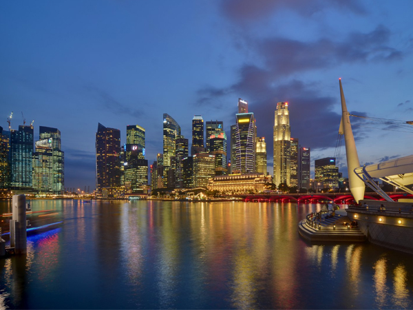 Harbor and city of Singapore at night.